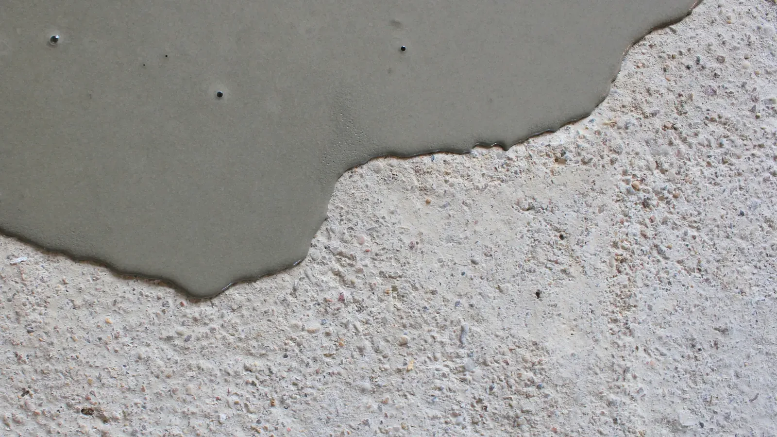 Self-levelling compound poured over a concrete subfloor, Signature Carpets and Flooring