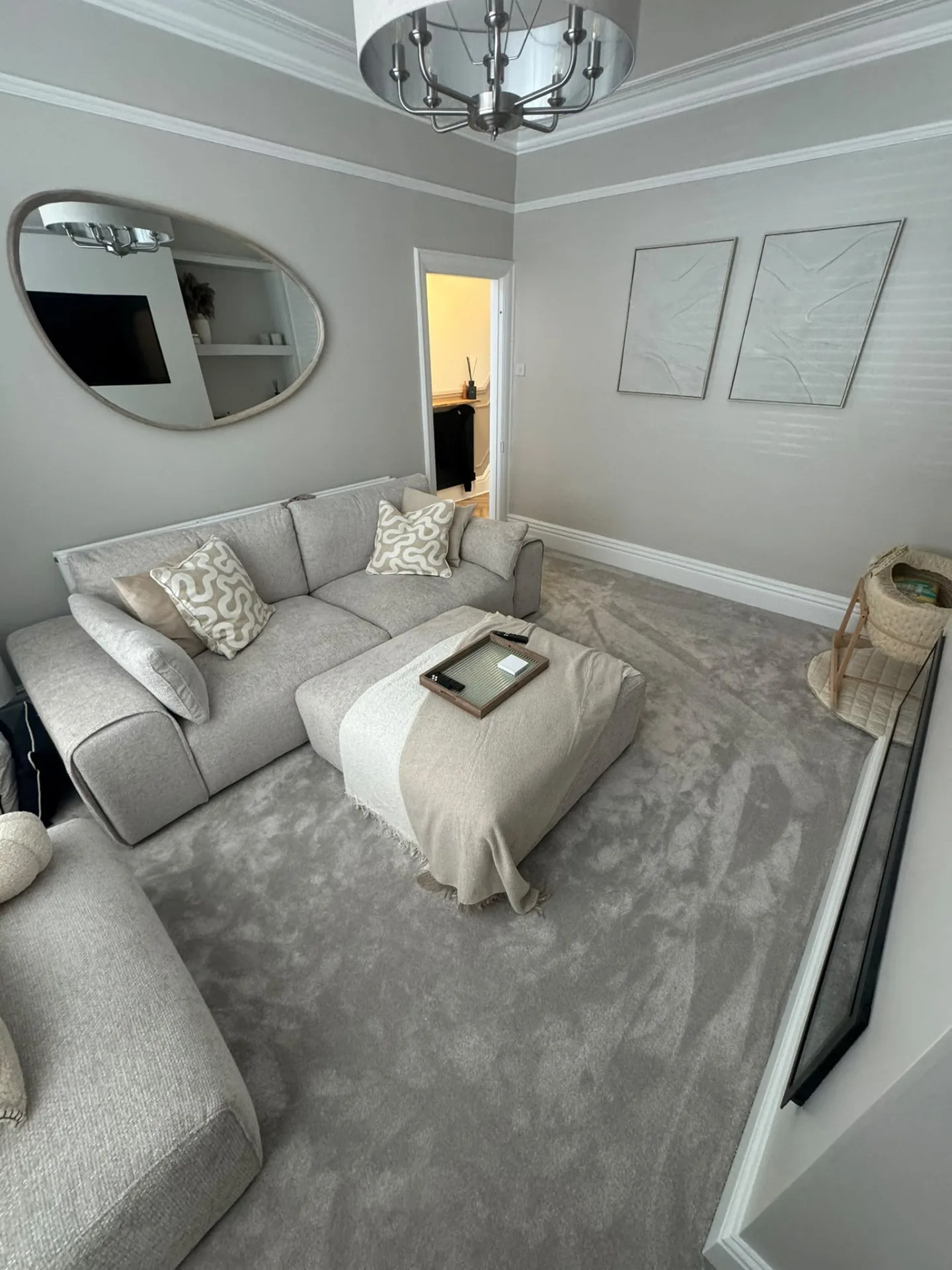 Pale grey carpet fitted in a bright living room, Signature Carpets and Flooring, Greater Manchester