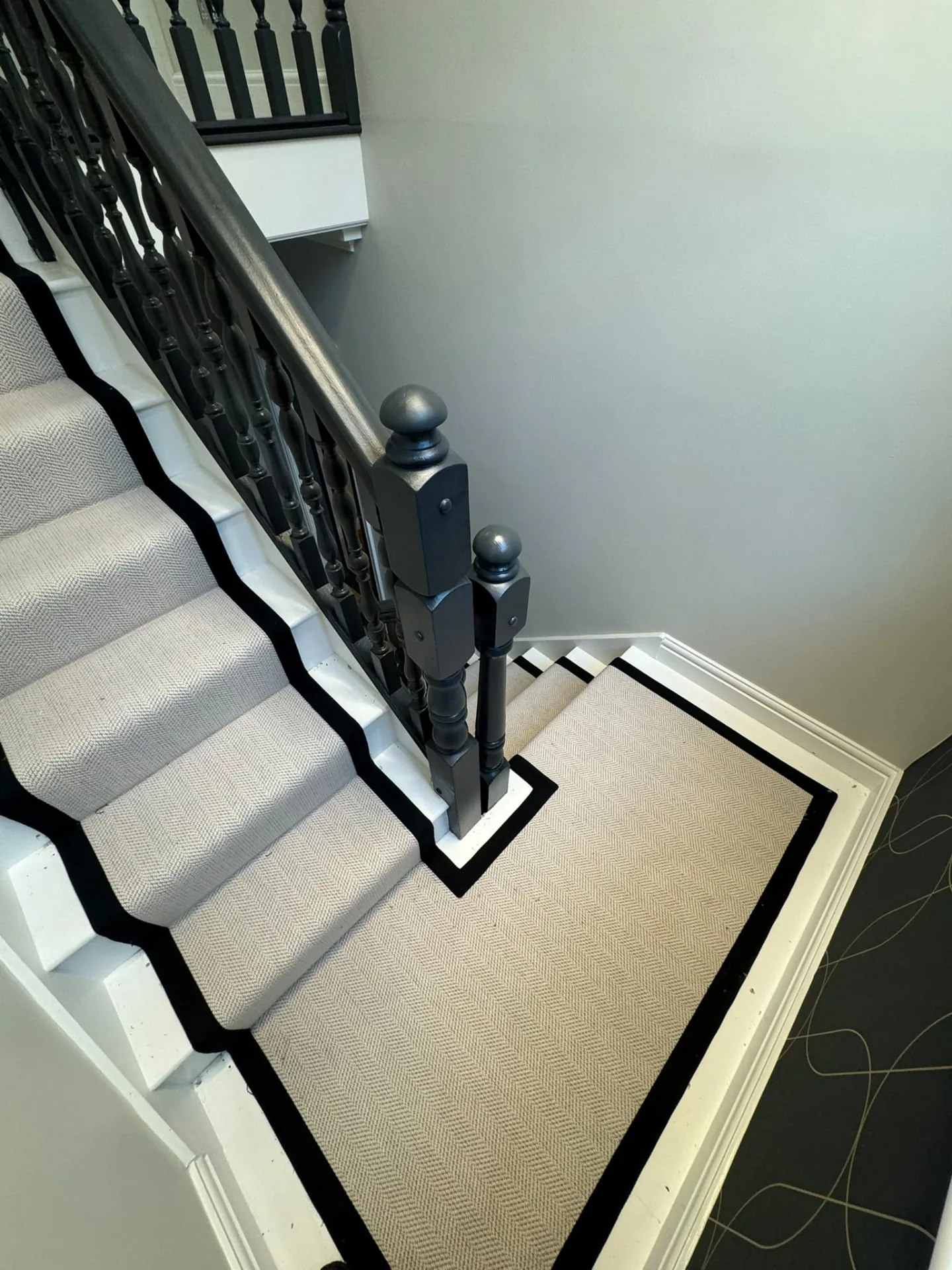 Patterned stair runner with dark borders continuing onto the landing, Signature Carpets and Flooring, Greater Manchester