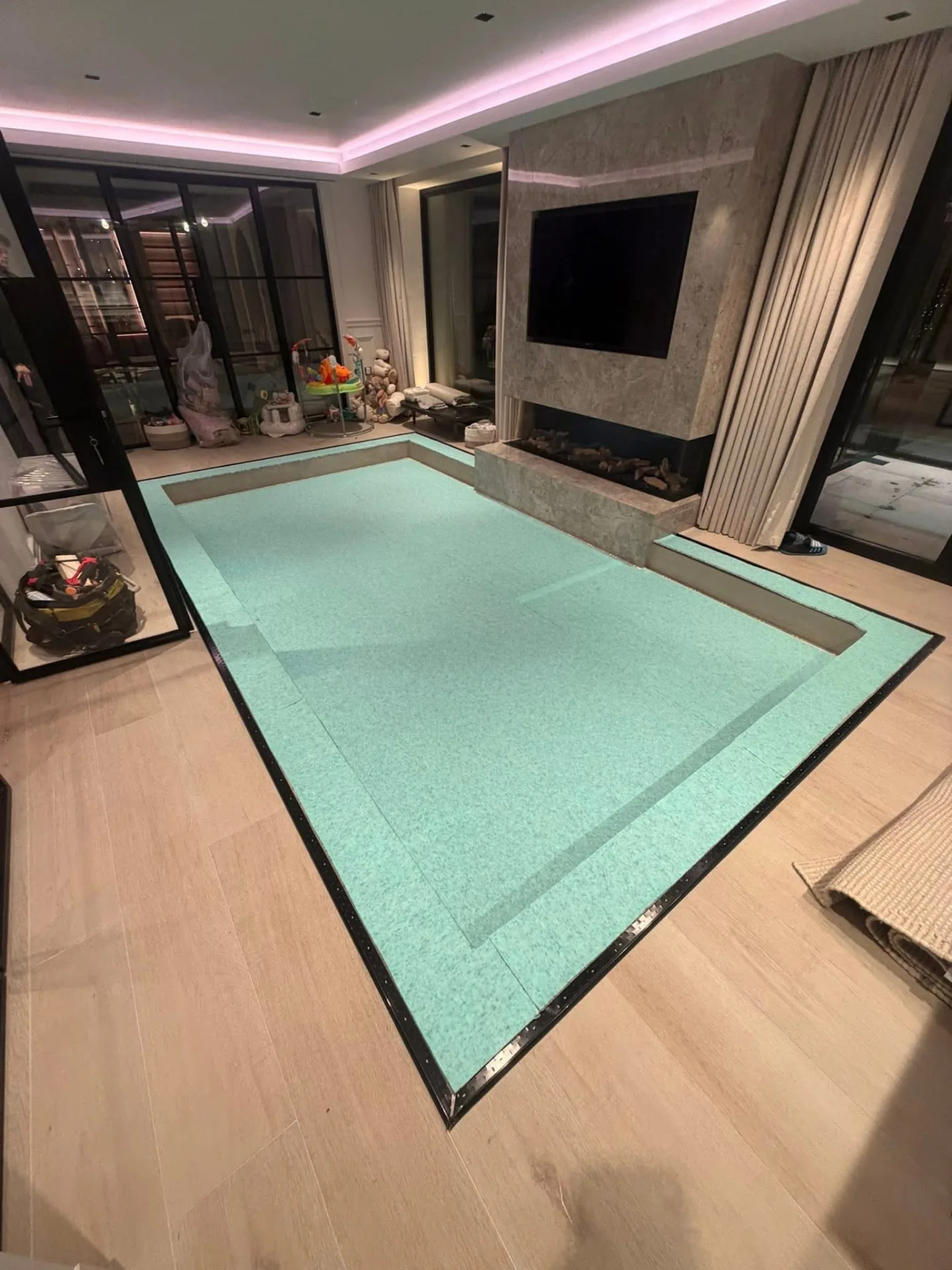 Underlay and gripper fitted in a sunken living room during carpet installation, Signature Carpets and Flooring, Greater Manchester