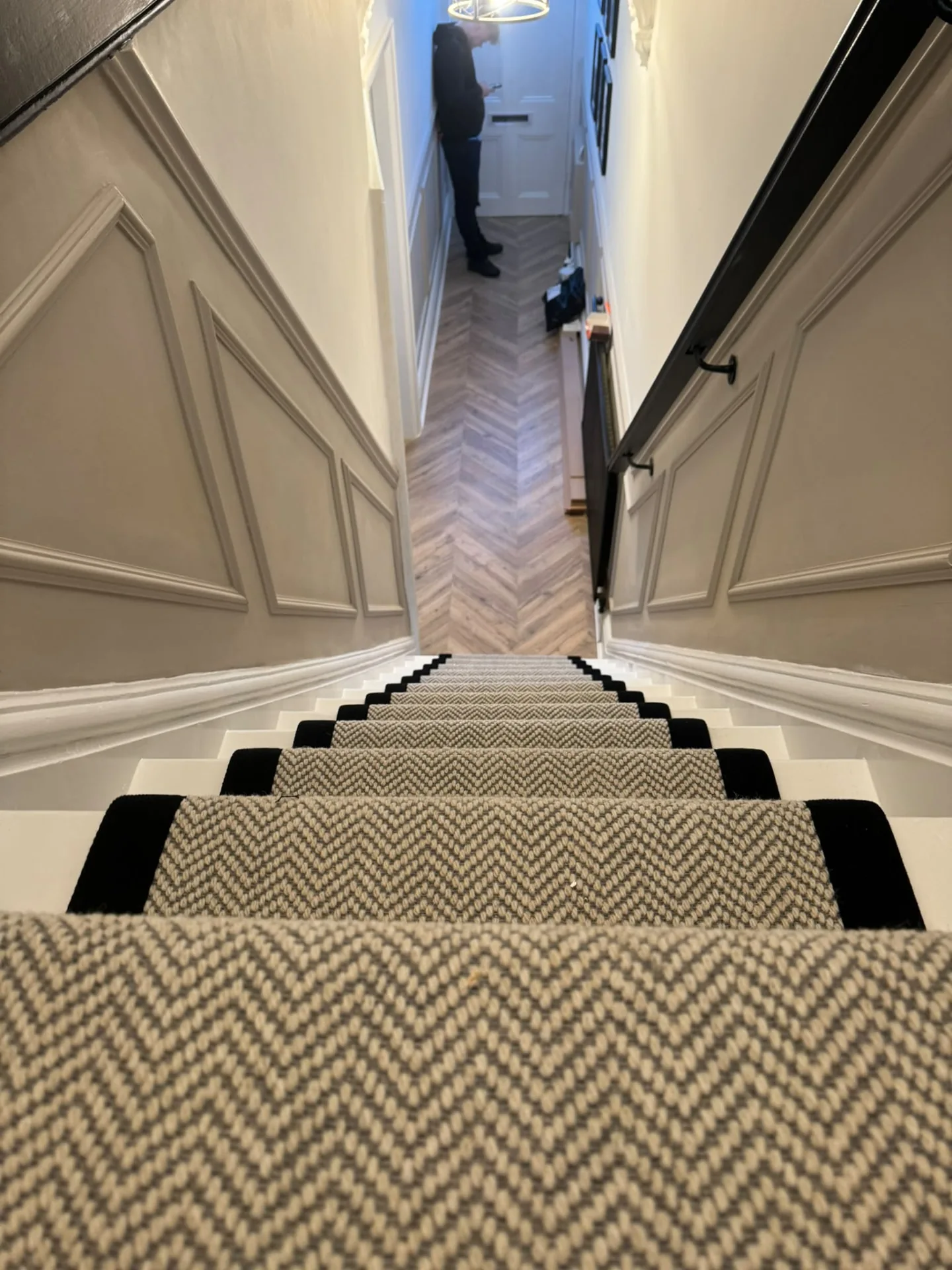 Matching patterned runner fitted up a staircase and across the landing, Signature Carpets and Flooring, Greater Manchester